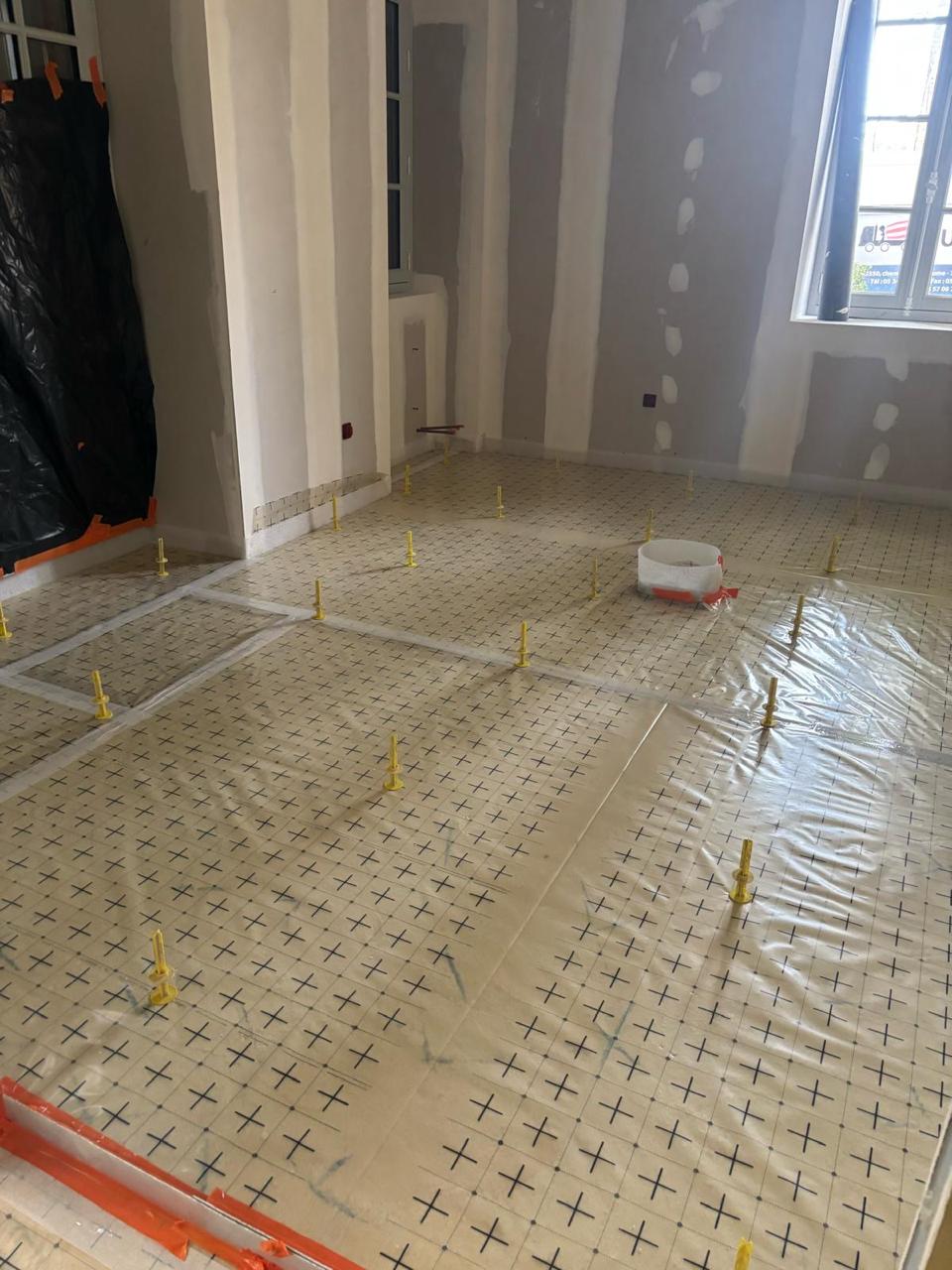 Préparation isolant et trépieds avant coulage